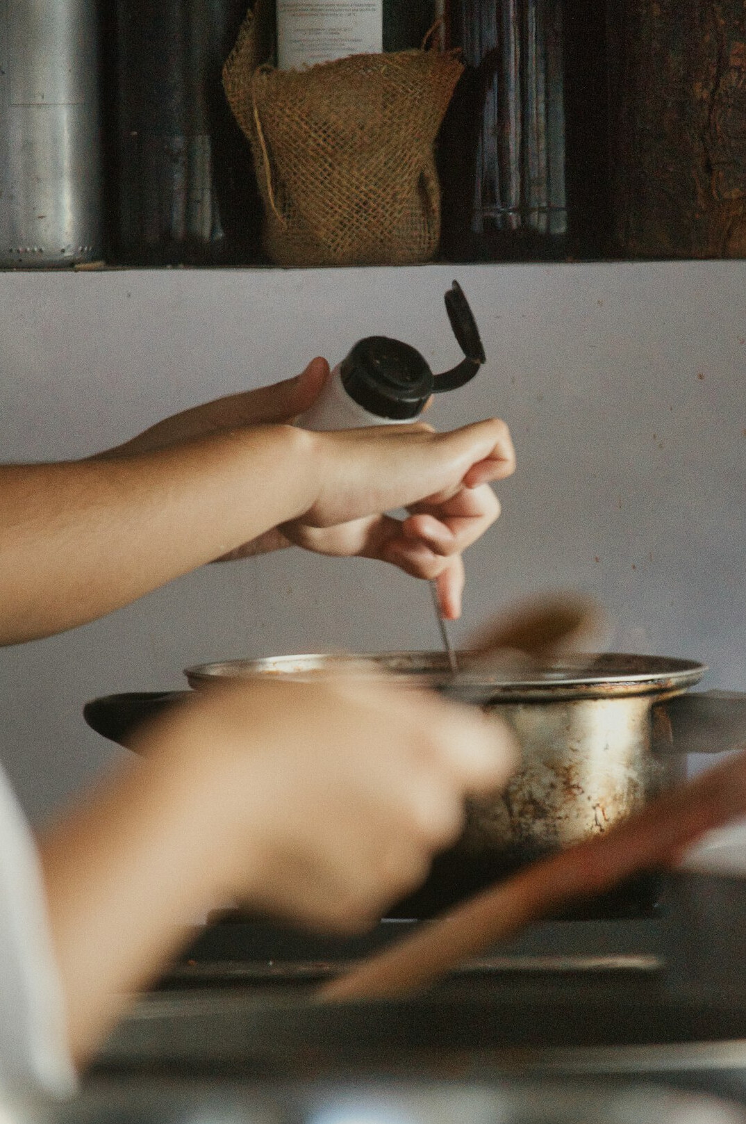woman cooking in kitchen