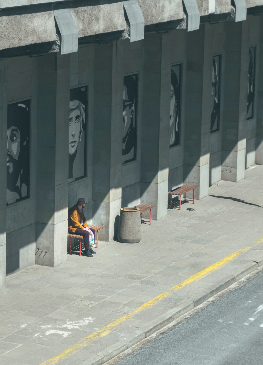old man sitting on bench