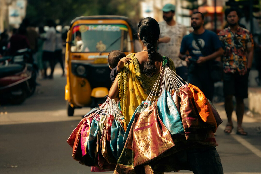 woman carrying grocery bags